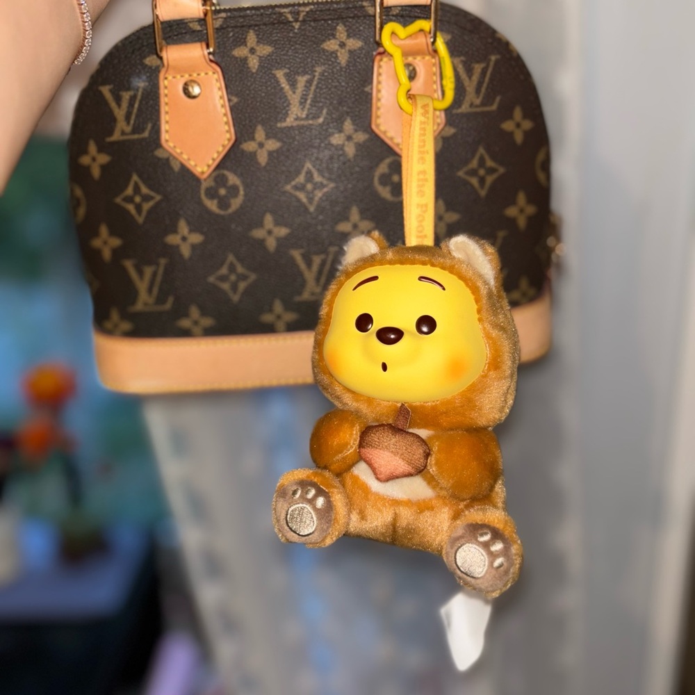 Miniso Winnie the Pooh squirrel plush keychain